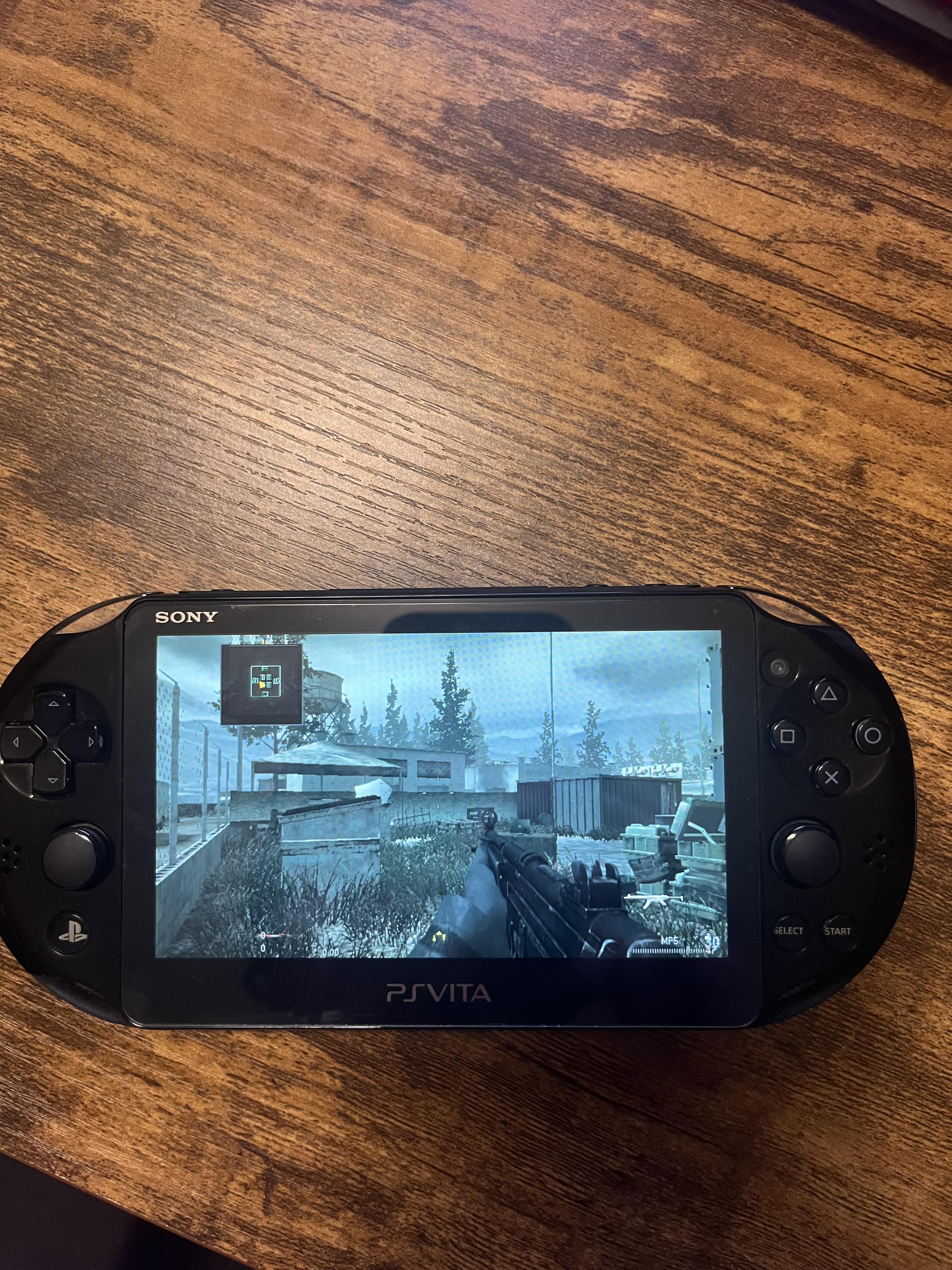 Call of Duty 4 gameplay photographed on a PS Vita
