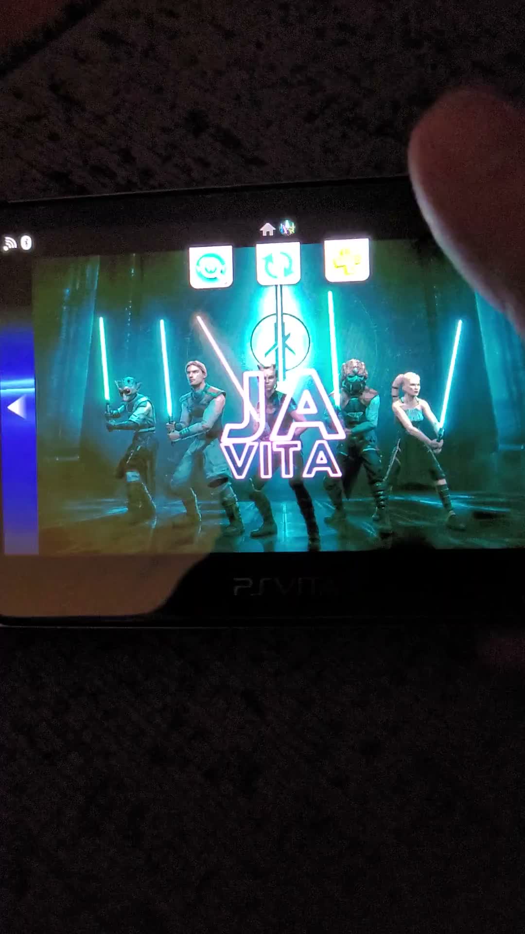 Jedi Academy Vita title screen photographed on a PS Vita